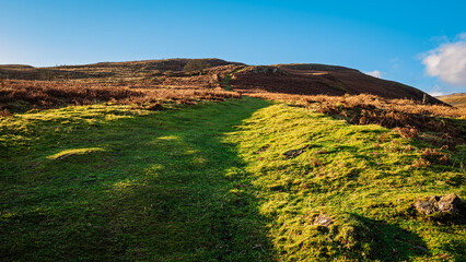 Footpath to the summit of Brough Law, a hill at the Breamish Valley, a scenic river valley in Northumberland, in the National Park. It&rsquo;s known for its rolling hills, at the foot of the Cheviot Hills