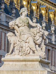 Fototapeta premium Sculpture at Golden gate of Versailles palace, Paris suburbs, France