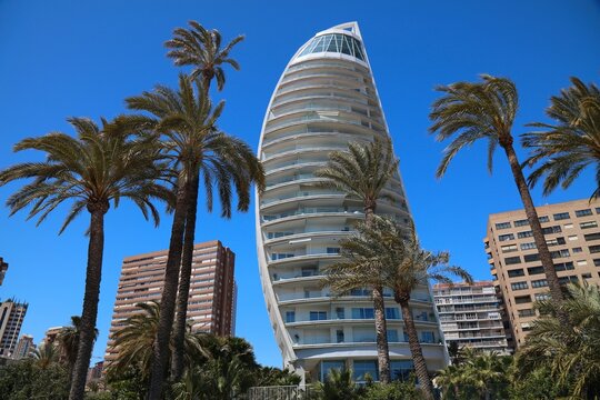 BENIDORM, SPAIN - APRIL 9, 2025: Delfin Tower apartment building in Poniente neighborhood of Benidorm, Spain.