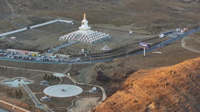 The White Pagoda of Daocheng County at dusk