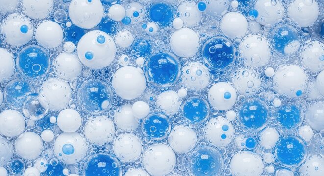 Numerous white and blue spheres of varying sizes densely packed together forming an abstract texture