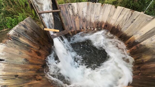 The water flow down the slide in vintage swirl washing machine