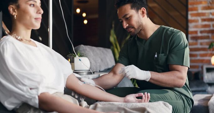 Doctor, woman and insert iv drip in clinic with gloves for wellness, natural medicine and hydration. Healthcare worker, people and help with intravenous fluid, homeopathic drugs and vitamin benefits.
