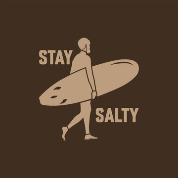 Hand drawn man carrying a surfboard vintage style vector with slogan stay salty graphic for print items.