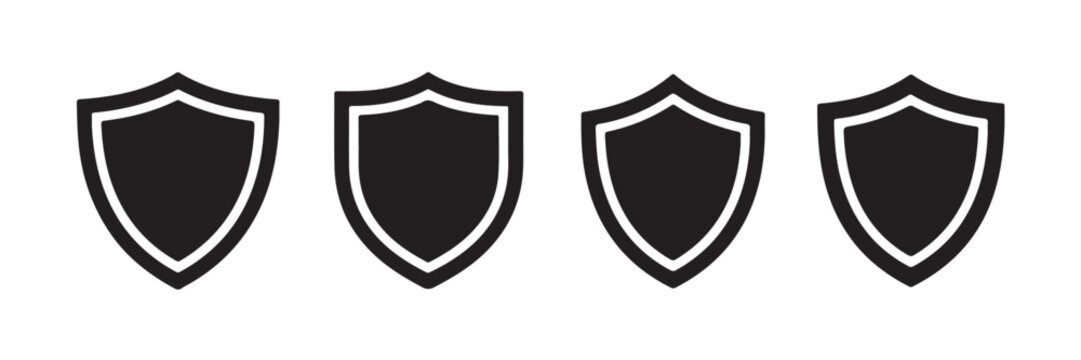 Set of black shield icons with inner borders representing security protection and defense on transparent grid background