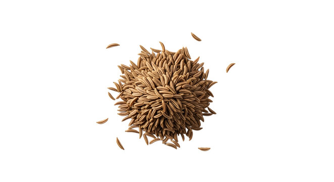 Heap of cumin seeds scattered on surface