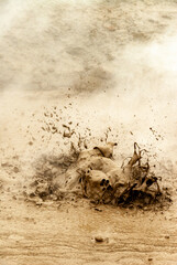 Obraz premium Steaming Geothermal Landscape, in Iceland, with Hot Mud and Volcanic Soil