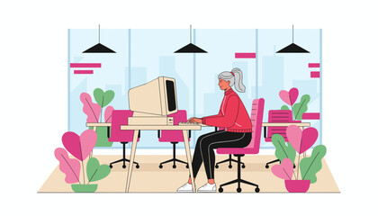 Employee uses a vintage computer in a modern colorful office setting focusing on work and productivity