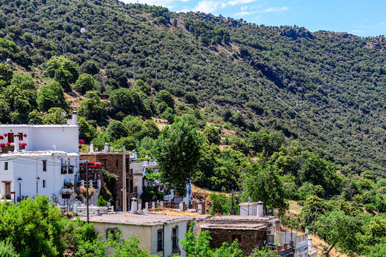 Picturesque view of a village Bubion located on a mountainside in the Sierra Nevada region of Spain