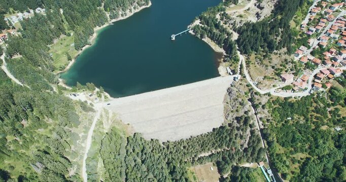 Elevated perspective of Dospat water reservoir and town in Southern Bulgaria