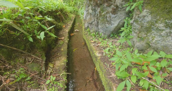 4K video; water flowing in a levada, a traditional man made irrigation channel on the island of Madeira.