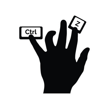 Hand pressing ctrl and z keys, illustrating undo action or keyboard shortcut
