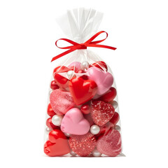 A clear plastic bag filled with pink and red candy isolated on transparent background