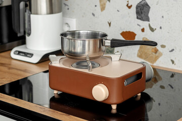 Portable camping gas stove used indoors during power outage