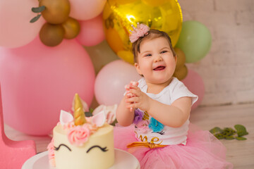 Fototapeta premium little girl with birthday cake 