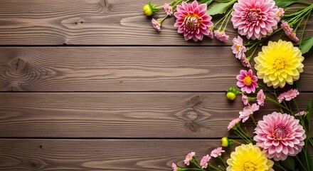 Border of vibrant dahlias and small blossoms on a textured wood surface © ASMA