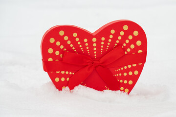 red hearts on the snow=