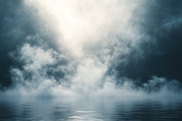 Moody sky over calm lake with fog and mist creating a tranquil, reflective scene