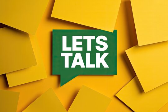Green speech bubble with 'LETS TALK' text on a vibrant yellow background with scattered yellow sticky notes, communication concept