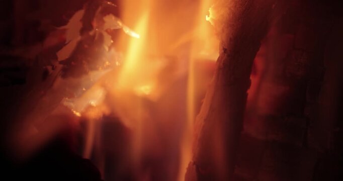 Flames of wood fire in fireplace
