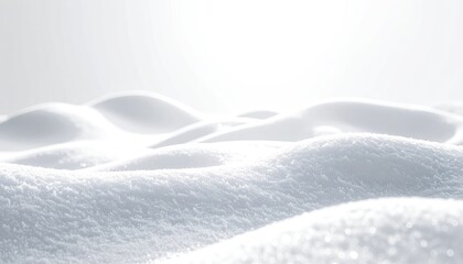 Fototapeta premium Abstract, brightly lit white snow drifts under a hazy sky.