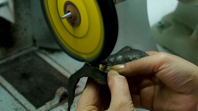 Jewelry Polishing Process Close Up - High Angle Reverse Shot in Slow Motion