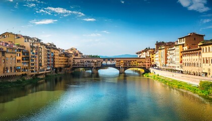 Fototapeta premium panoramic view of medieval stone bridge ponte vecchio over arno river in florence firenze tuscany italy europe florence cityscape architecture and landmark of florence and italy