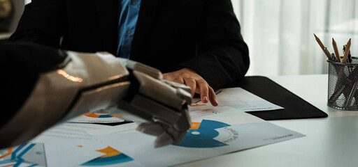 A high-tech business setting where AI-driven solutions assist in analyzing company performance,...