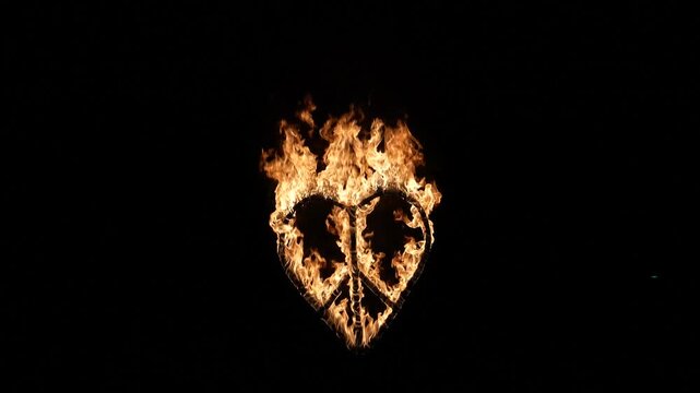 Famous fire show on the beach of Phi Phi island, fire show, burning pacific symbol