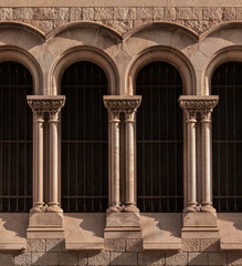 On the streets in Catalonia, public places. Elements of architectural decorations of buildings, doorways and arches, plaster moldings and patterns.  © Kozlik_mozlik