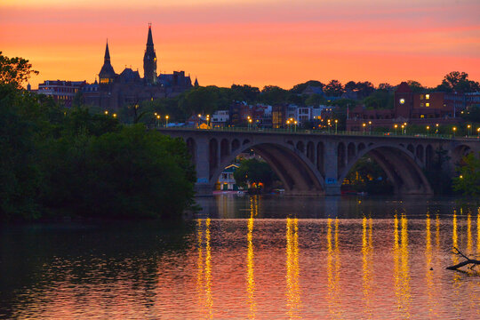 Sunset over the Potomac river, Georgetown, Georgetown University, Key Bridge and The Potomac River Boathouse in Washington, D.C.