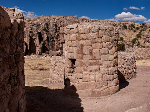 Maukallaqta archaeological complex which feature distinctive domed stone structures and cylindrical towers. Located in the Coporaque district of Espinar, this site is renowned for its well-preserved 