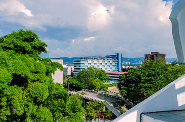 Urban panoramic view taken from the cultural center, with Guatemala City stretching across the horizon under an open and expansive sky.