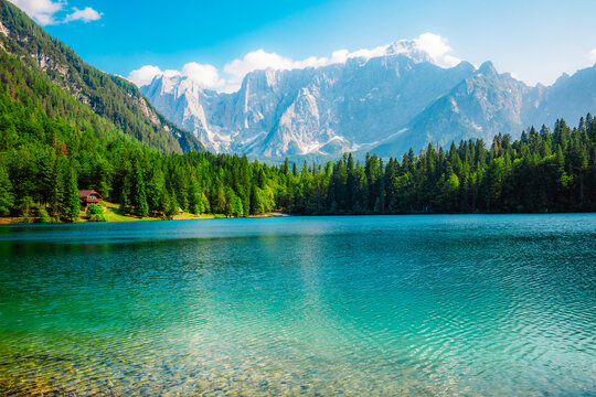 Lake of Fusine or Lago Superiore di Fusine in the Mountain Range of Mount Mangart in Julian Alps near Tarvisio in Italy near Slovenia