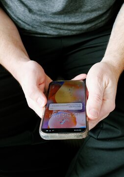 Man Receives Fraudulent SMS Text Messages Attempting to Obtain Money and Sensitive Personal Information - Online Banking Scam Cybersecurity Awareness