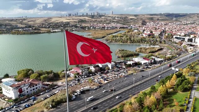 Majestic Turkish flag waving in the wind with a blue sky background