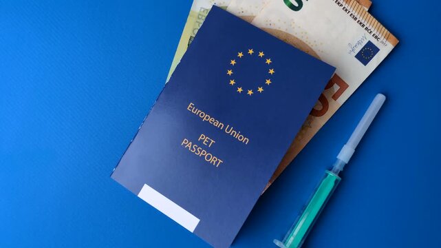 A pet passport is a document with vaccination and travel information for a cat, dog, or other animal. A pet passport as a background for your design.