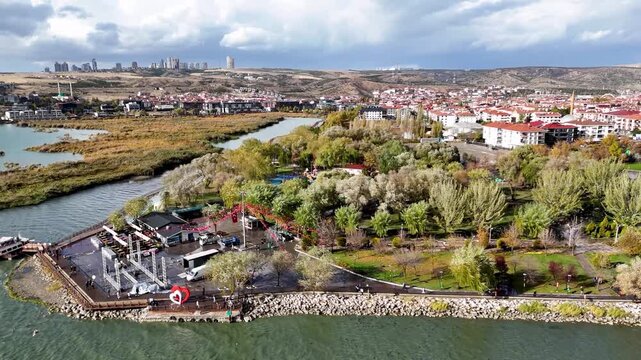 Close-up drone shot of the walking paths and green areas in Mogan Park