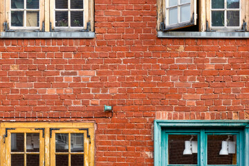 Historic Red Brick Facade in Dutch Quarter Potsdam Germany with Colorful Yellow and Teal Window Frames Traditional Masonry Architecture Detail