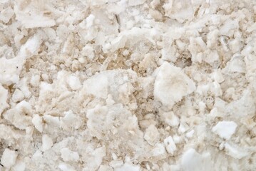 Texture of dirty melting snow and ice close-up