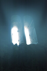 Light from the window of an ancient castle at night, closeup of photo
