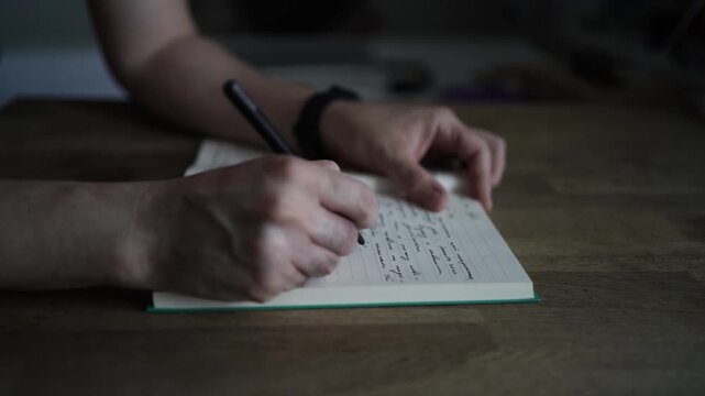 Writing in Journal Closeup with Pen on Paper