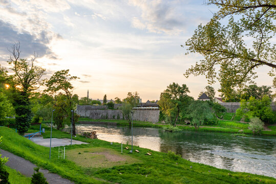 Banja Luka, Bosnia and Herzegovina &ndash; May 11, 2024: View of Vrbas river with people spending free time near Kastel fortress in the city center.