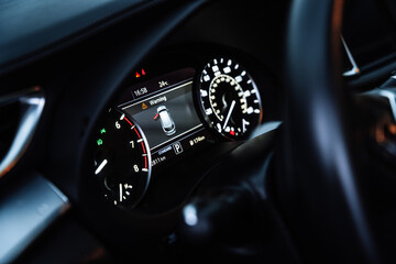 Modern Car Dashboard with Digital Instrument Cluster at Night © onphotoua