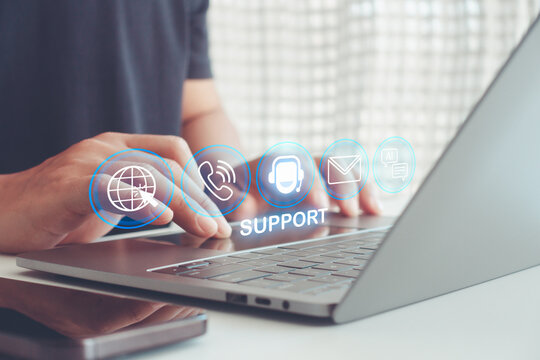 Customer service and technical support technology concept. Person hand using laptop with digital icon, ai assistance, chat, email, call center, global service for online business, IT solution.