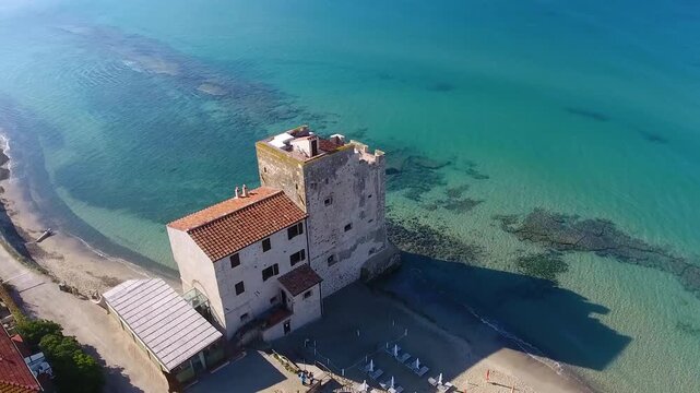 Drone view of Torre Mozza seaside near Follonica on sunny summer day in Tuscany