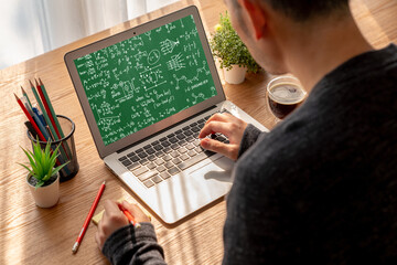 Mathematic equations and modish formula on computer screen showing concept of science and education