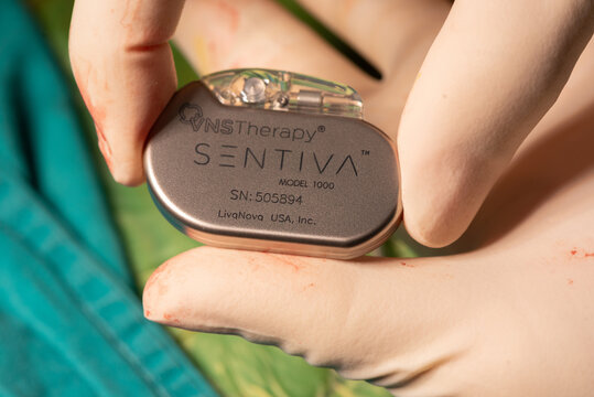 Bangkok, Thailand- January 23, 2026: A vagal nerve stimulation generator in neurosurgeon hand