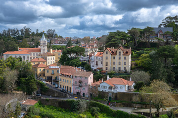 Fototapeta premium Picturesque view of a Portuguese town with red roofs and hills.