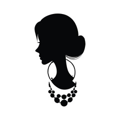 Silhouette of woman with bun hairstyle and jewelry © Aisyah Faiha